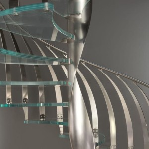 Contemporary-Glass-spiral-staircase-curved-glass-treads-helical-centre-column-with-designer-stainless-steel-curved-balustrade
