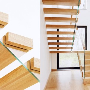 Open rise floating oak staircase with feature oak covers Open rise floating oak staircase with feature oak covers