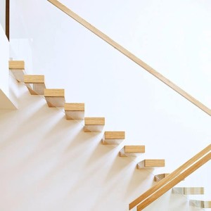 Floating stairs with oak treads secret fixed frameless glass balustrades Floating stairs with oak treads secret fixed frameless glass balustrades
