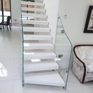 Floating stair contemporary white finish with frameless glass balustrades Floating stair contemporary white finish with frameless glass balustrades