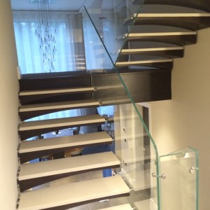 Dual tone gullwing shaped floating stairs Dual tone gullwing shaped floating stairs