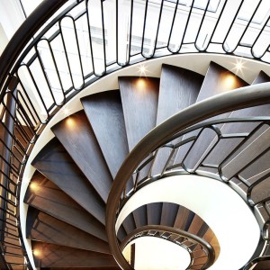 Helical staircase with contemporary elliptical balustrades Helical staircase with contemporary elliptical balustrades