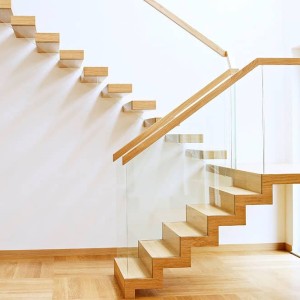 Oak floating stair secret fixing frameless glass balustrade wit self supporting zigzag entrance to stair Oak floating stair secret fixing frameless glass balustrade wit self supporting zigzag entrance to stair
