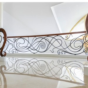 Designer bespoke handforged iron balustrade and feature continuos handrails Designer bespoke handforged iron balustrade and feature continuos handrails