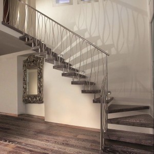 Floating stair with Gaudi style balustrade Floating stair with Gaudi style balustrade
