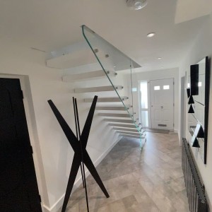 Floating Staircase white resin finish with frameless glass balustrades Floating Staircase white resin finish with frameless glass balustrades