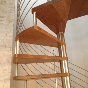 Oak spiral staircase traversal stainless rods and newel posts Oak spiral staircase traversal stainless rods and newel posts