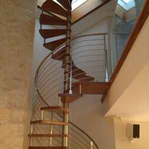 Oak spiral staircase traversal stainless rods and newel posts Oak spiral staircase traversal stainless rods and newel posts