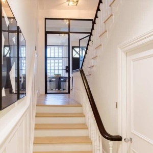 White parquet flooring and matching stair treads