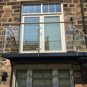 Stainless steel and glass balcony balustrade Stainless steel and glass balcony balustrade