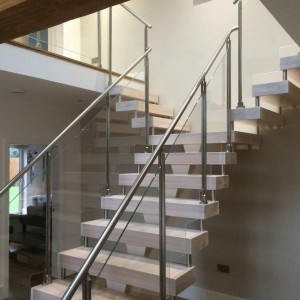 Central spine staircase with chunky treads Central spine staircase with chunky treads