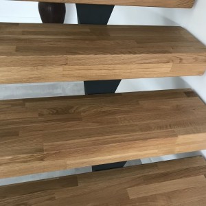 Central Spine staircase oak treads and frameless glass balustrade Central Spine staircase oak treads and frameless glass balustrade