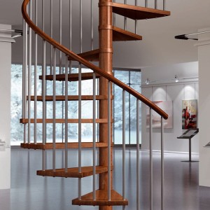 Modular spiral staircase in beech stained doussie with metal spindles and sectional wooden handrail large Modular spiral staircase in beech stained doussie with metal spindles and sectional wooden handrail large